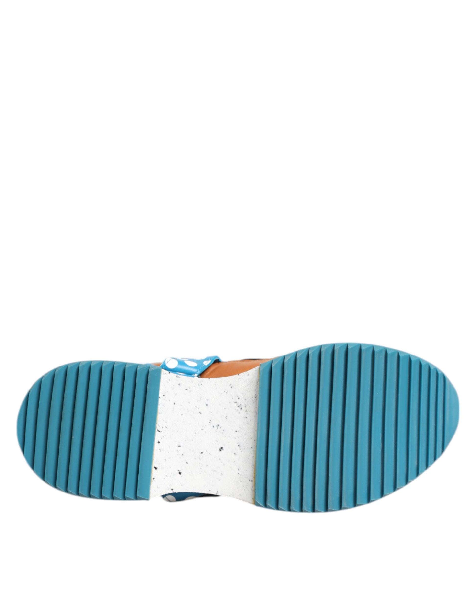Blue and white shoe on a footbed