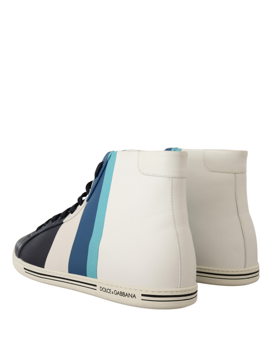 Pair of white sneakers with blue stripes