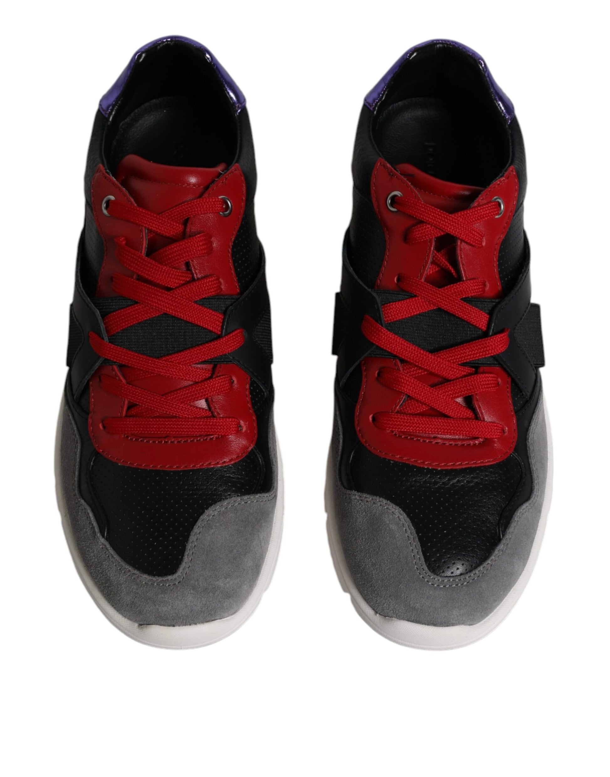 Pair of red and black sneakers with white soles