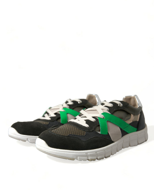 Pair of sneakers with green laces and a patterned design on the side