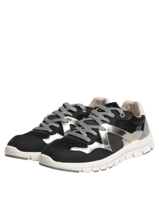 Black and white sneakers with gold accents, featuring a low top design