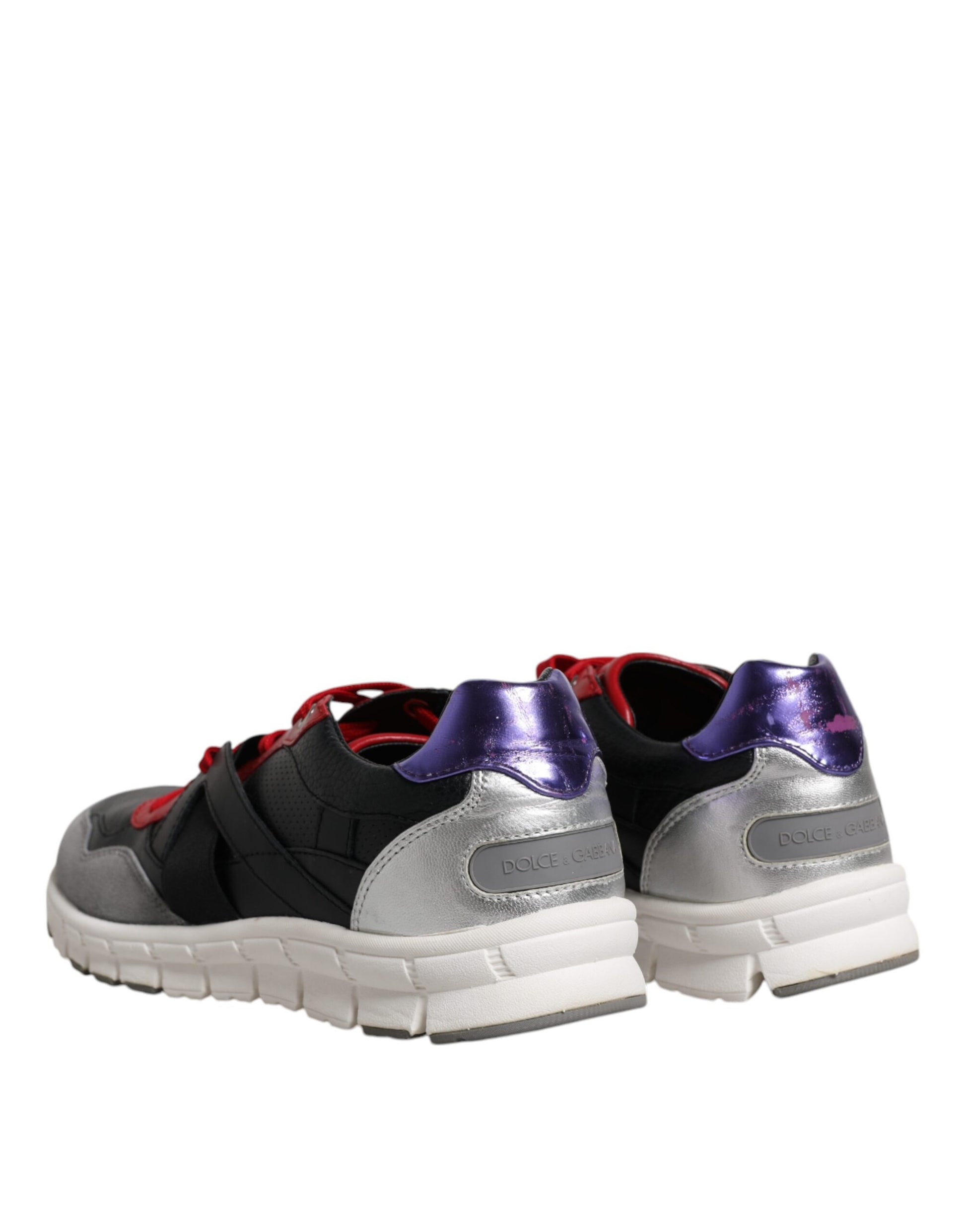 Pair of sneakers with purple and black laces