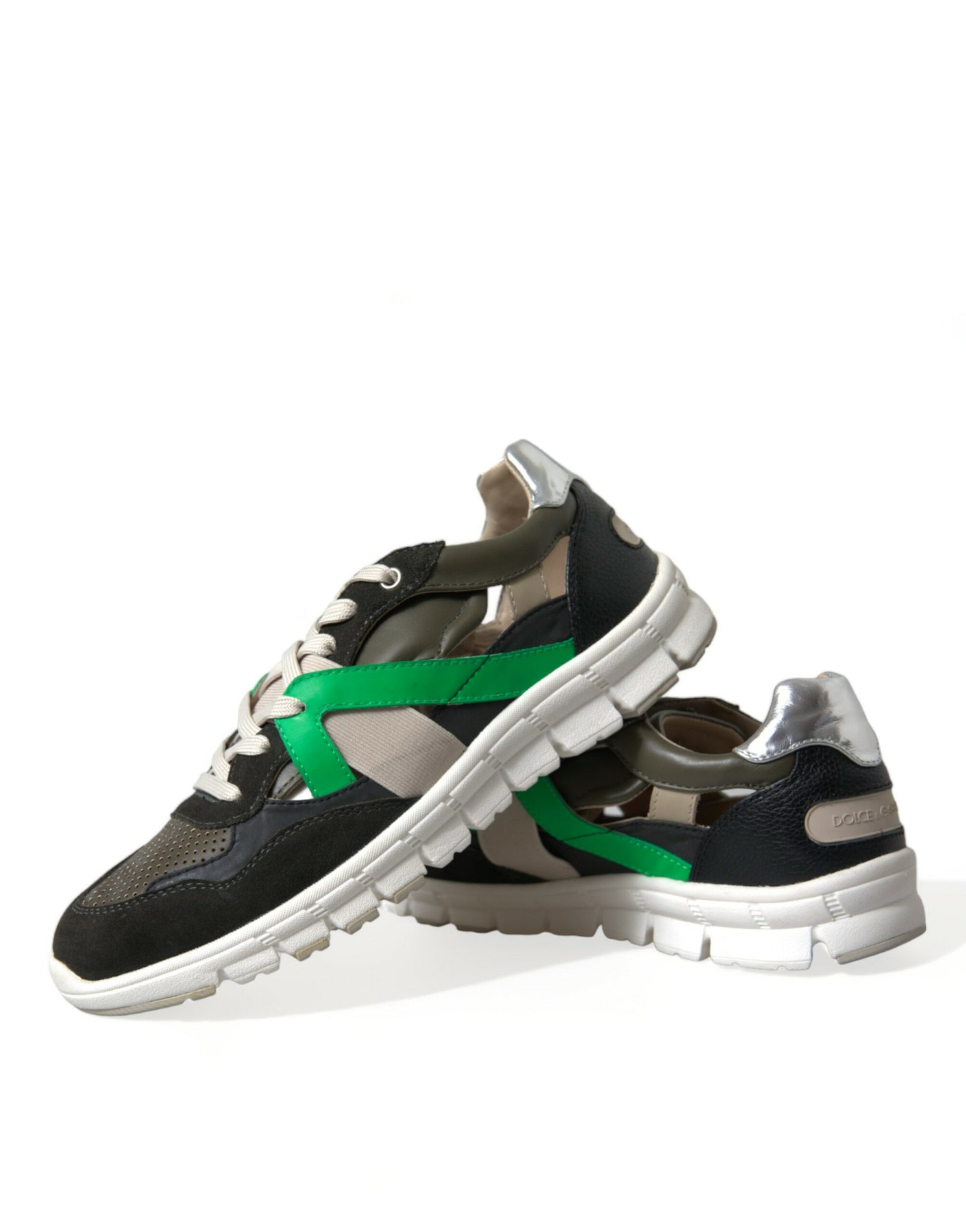 Pair of children's sneakers with green and black design