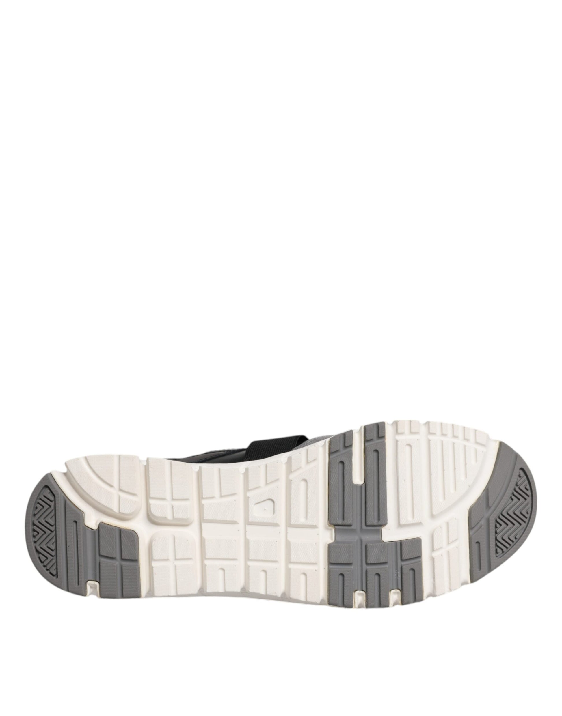 A single shoe against a plain background. It appears to be a running or athletic shoe with a white upper and black sole