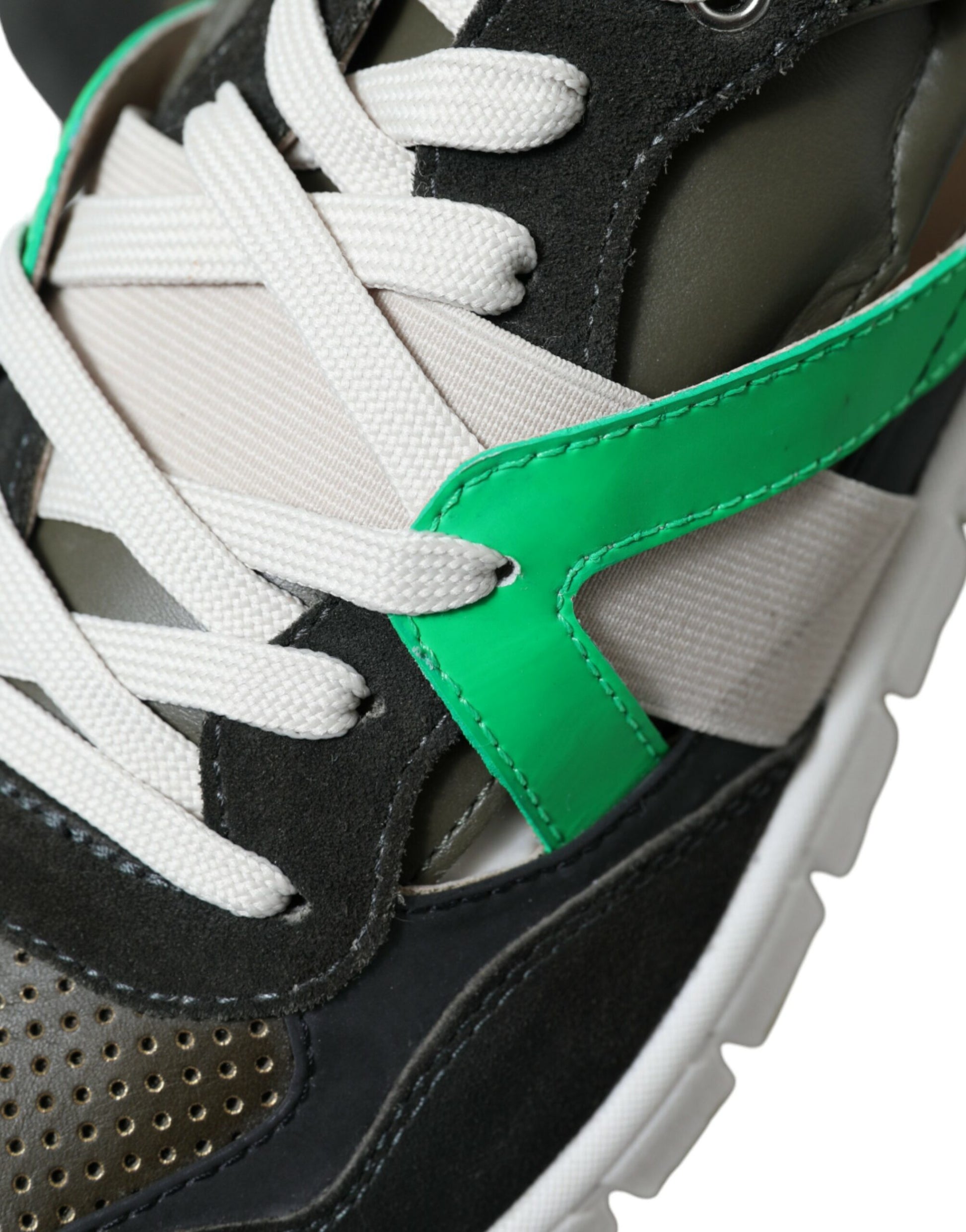 Black and white sneaker with green accents