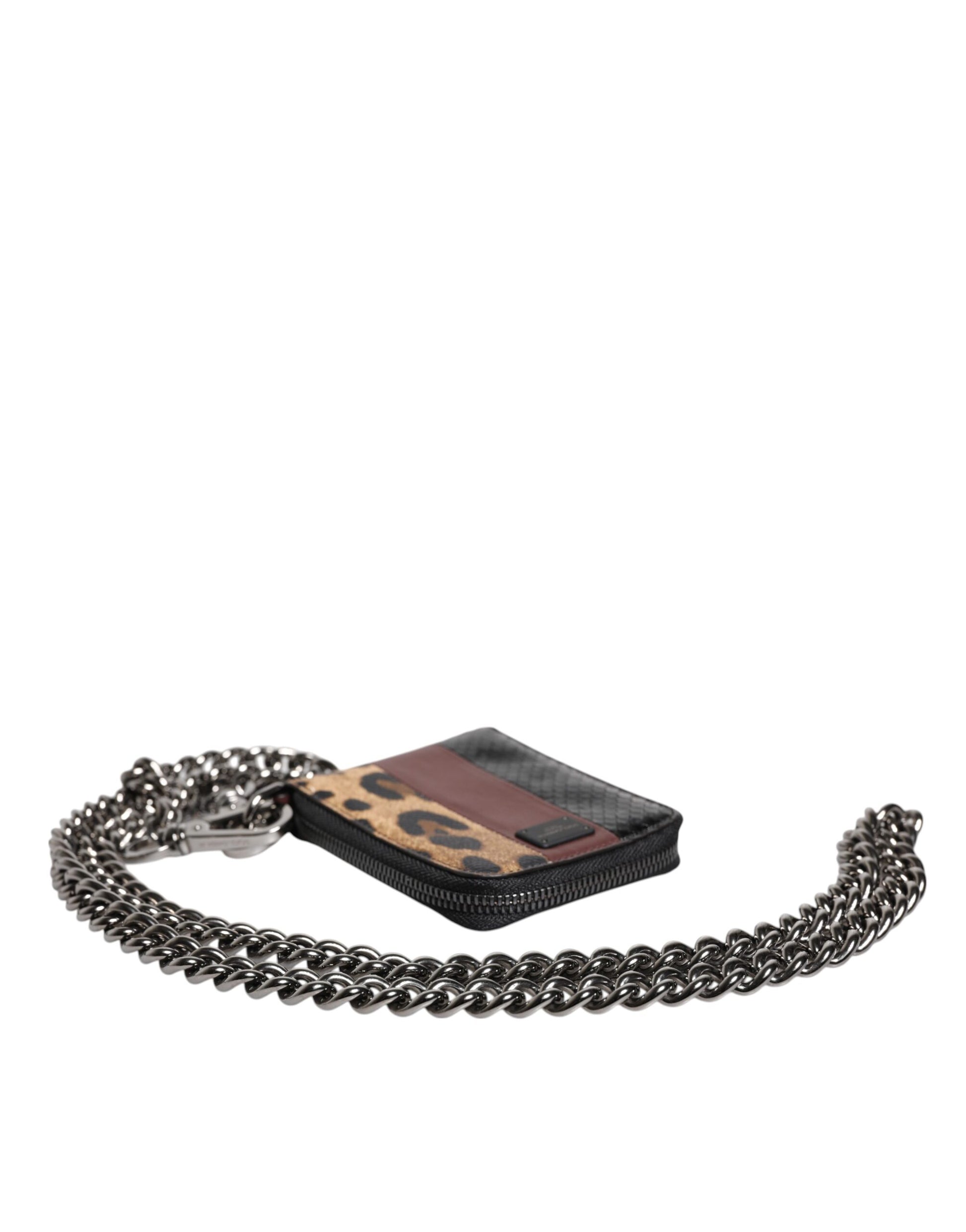 Necklace with black beads and a small brown clutch purse attached to it
