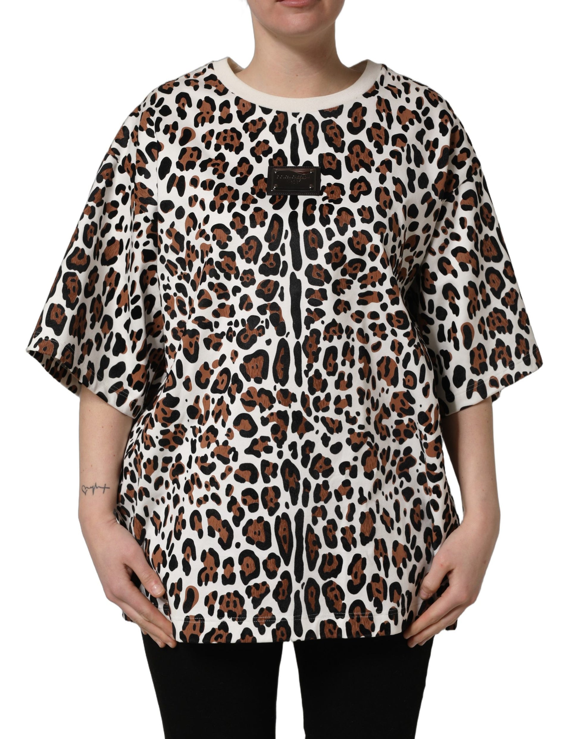 A woman wearing a leopard print crew neck t-shirt by Dolce & Gabbana