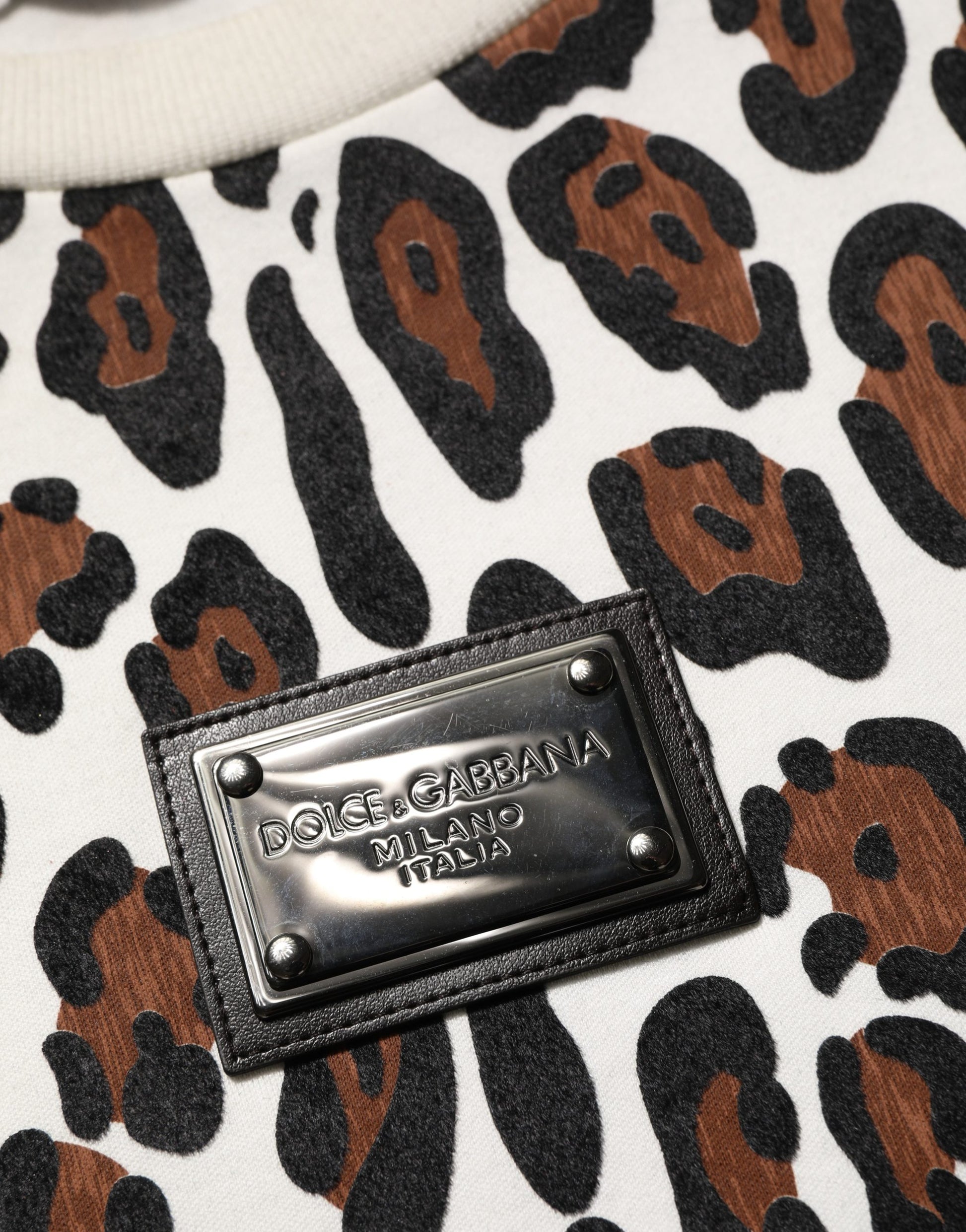 Black leopard print crew neck t-shirt with silver logo on front