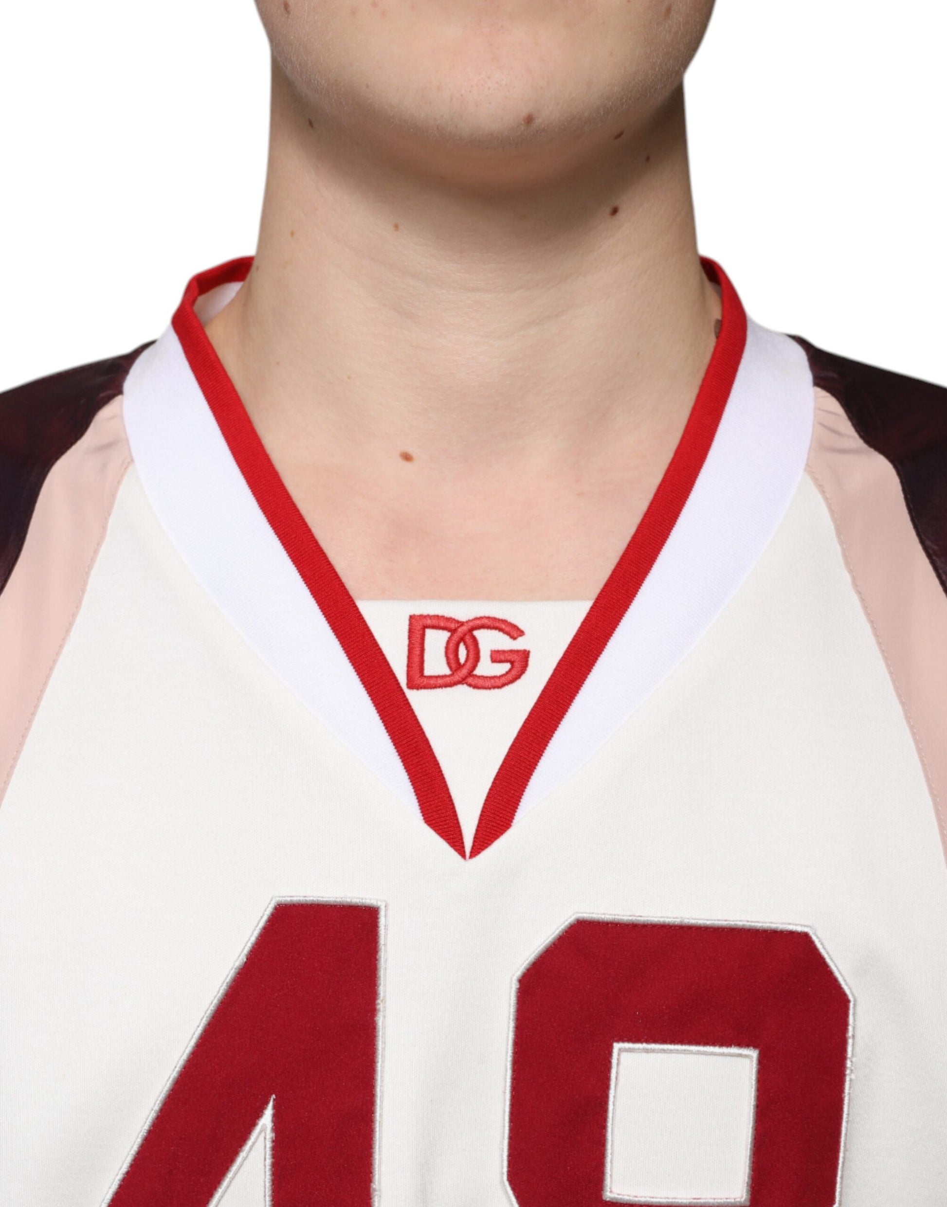 Man wearing basketball jersey with number 49
