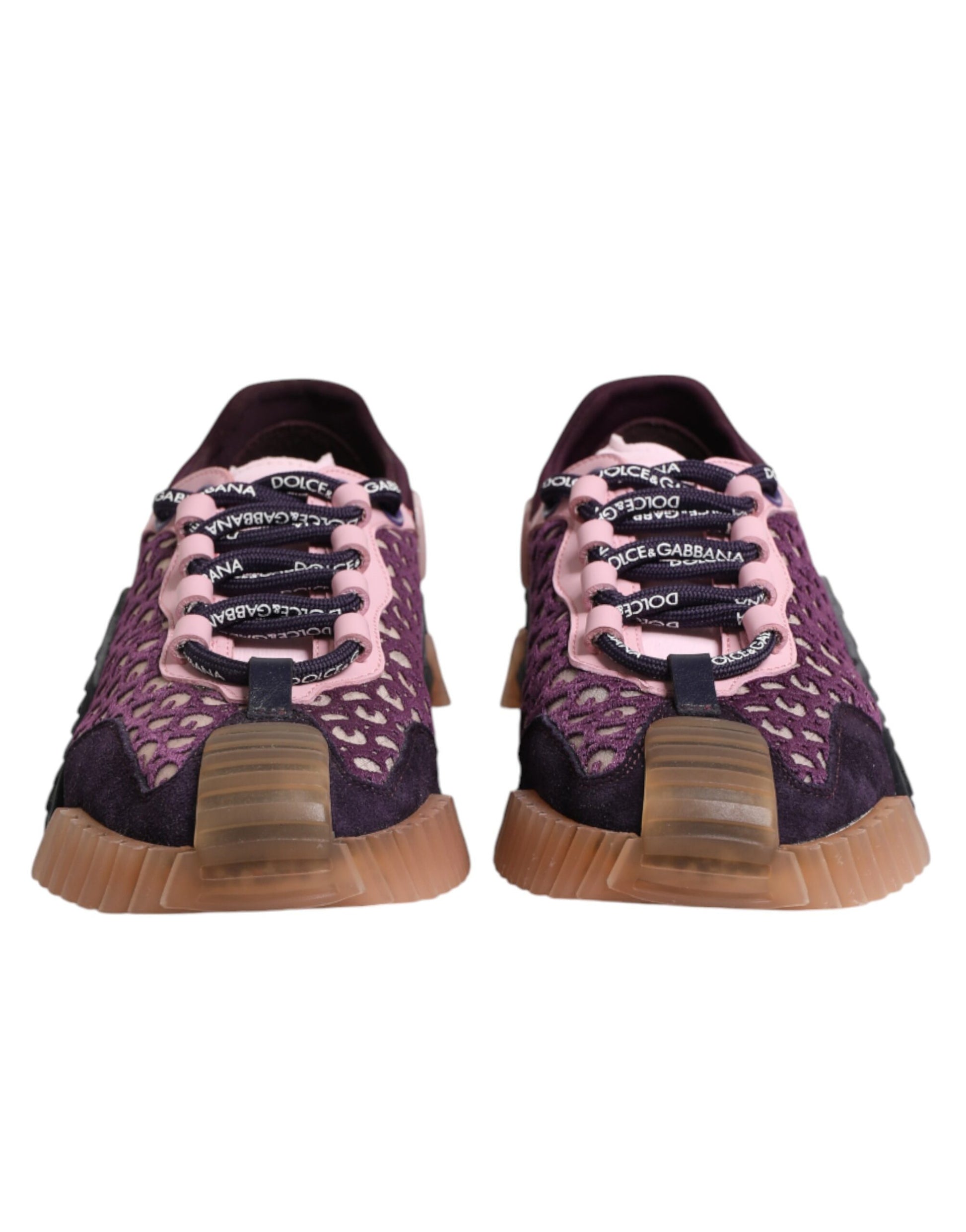 Pair of purple sneakers with pink laces