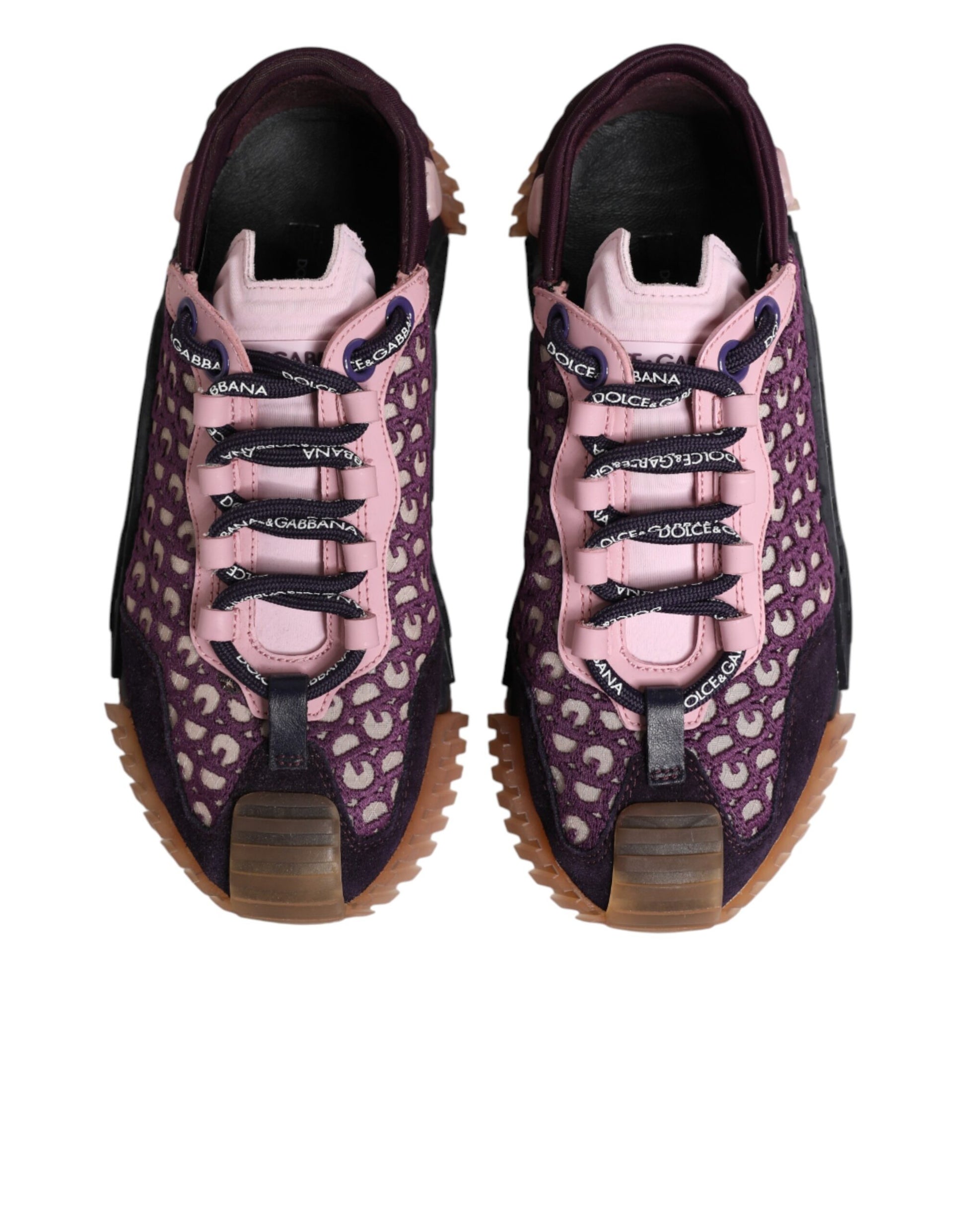 Pair of purple sneakers with pink laces and patterned design