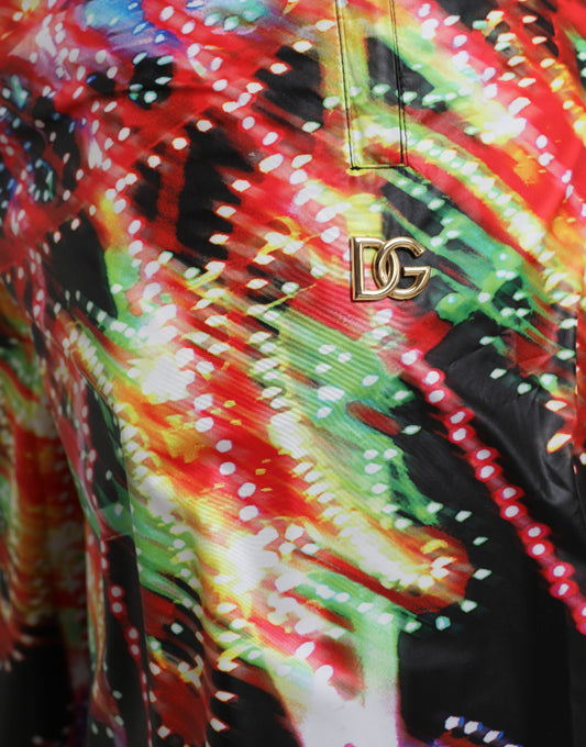 Colorful patterned garment with a gold logo on the sleeve