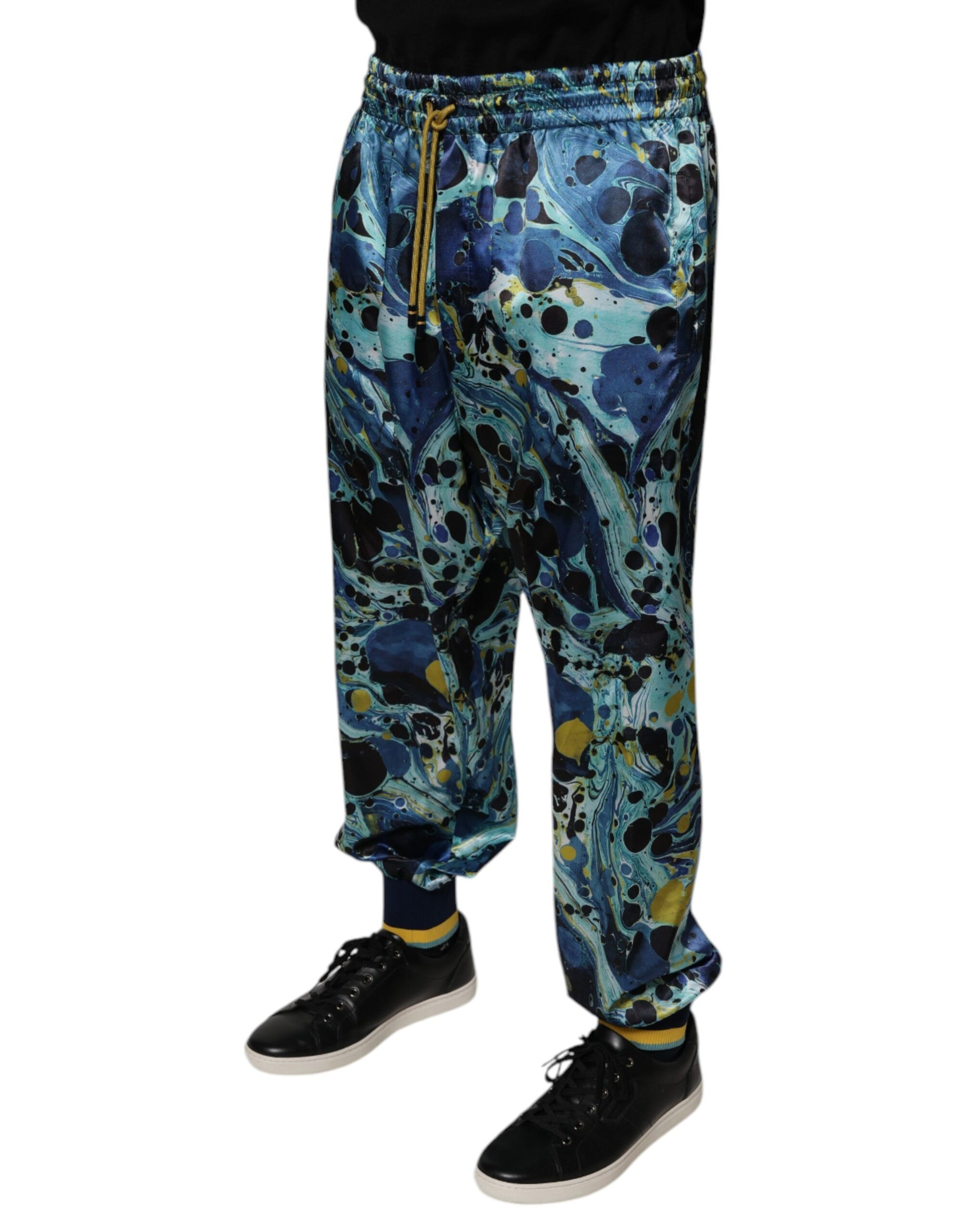 Man wearing blue pants with a patterned design