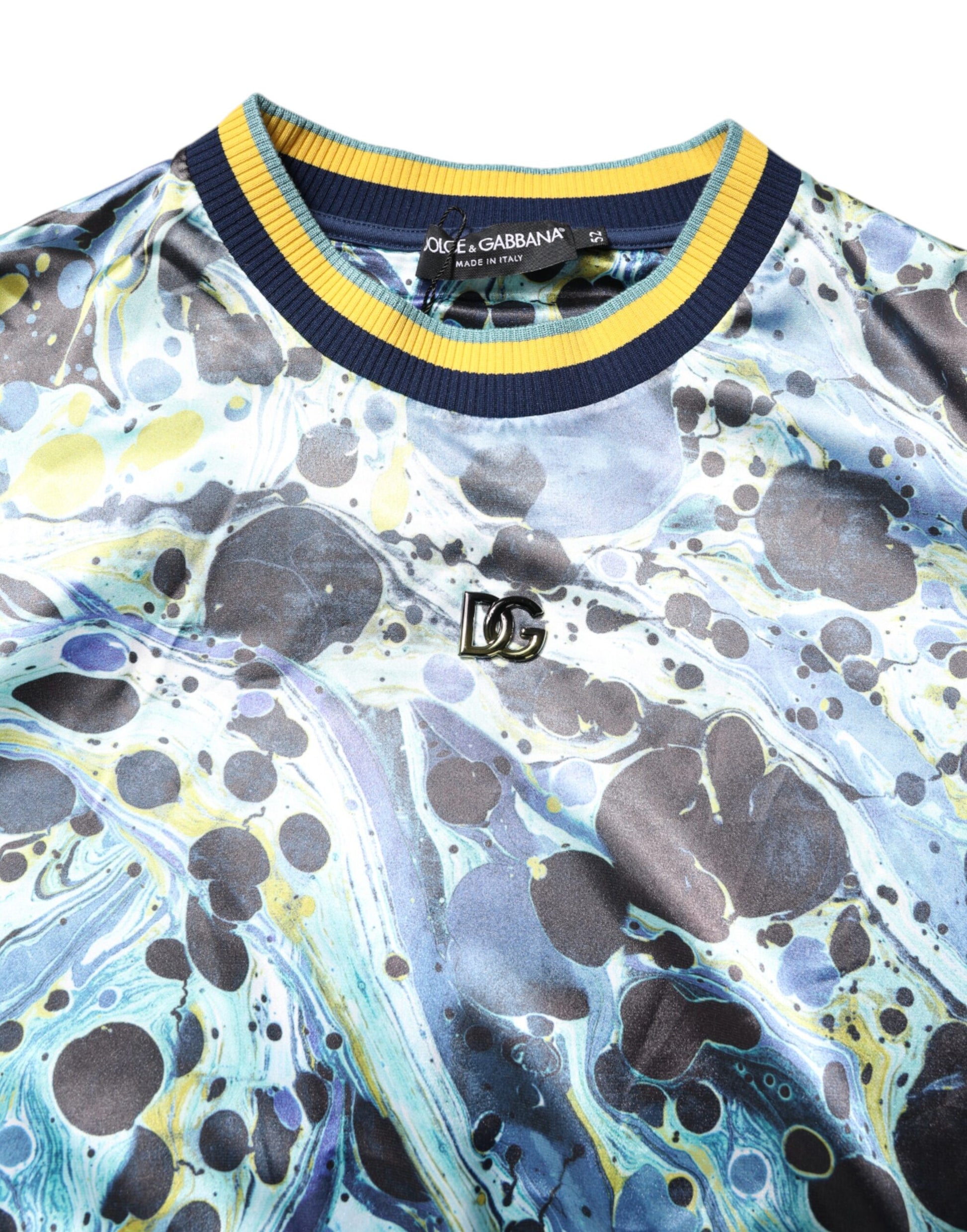Blue and yellow shirt with a patterned design