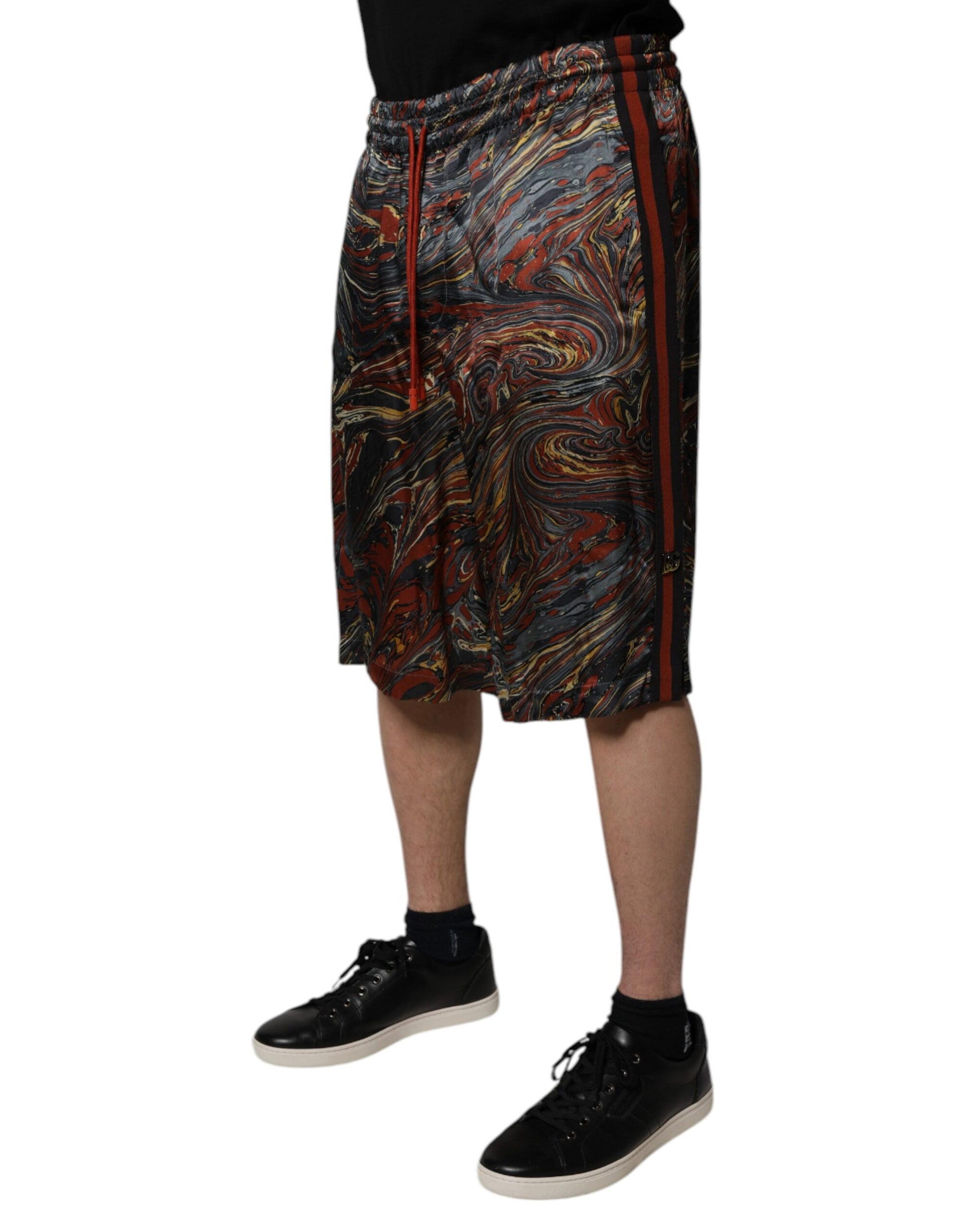 Man wearing shorts with a colorful pattern