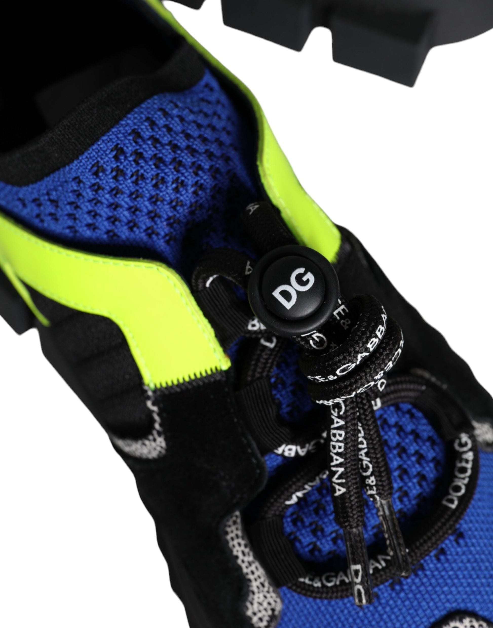 Blue and yellow hiking shoes with a black lace loop