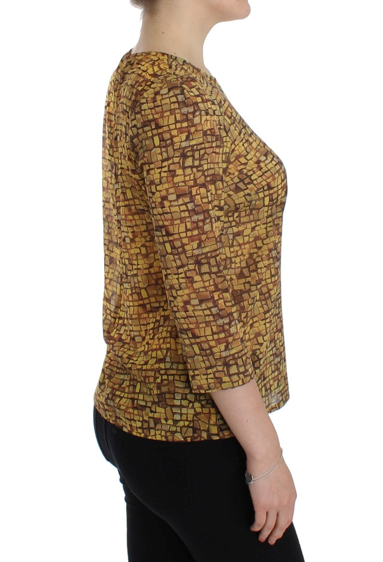 Woman wearing a brown patterned top