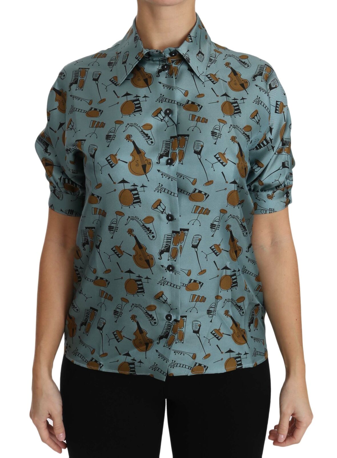 Woman wearing a short sleeve shirt with guitar pattern