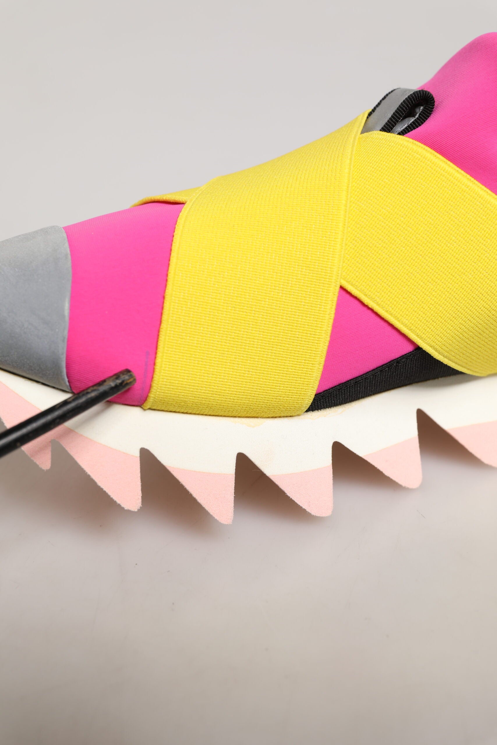 Pink and yellow shoe with straps