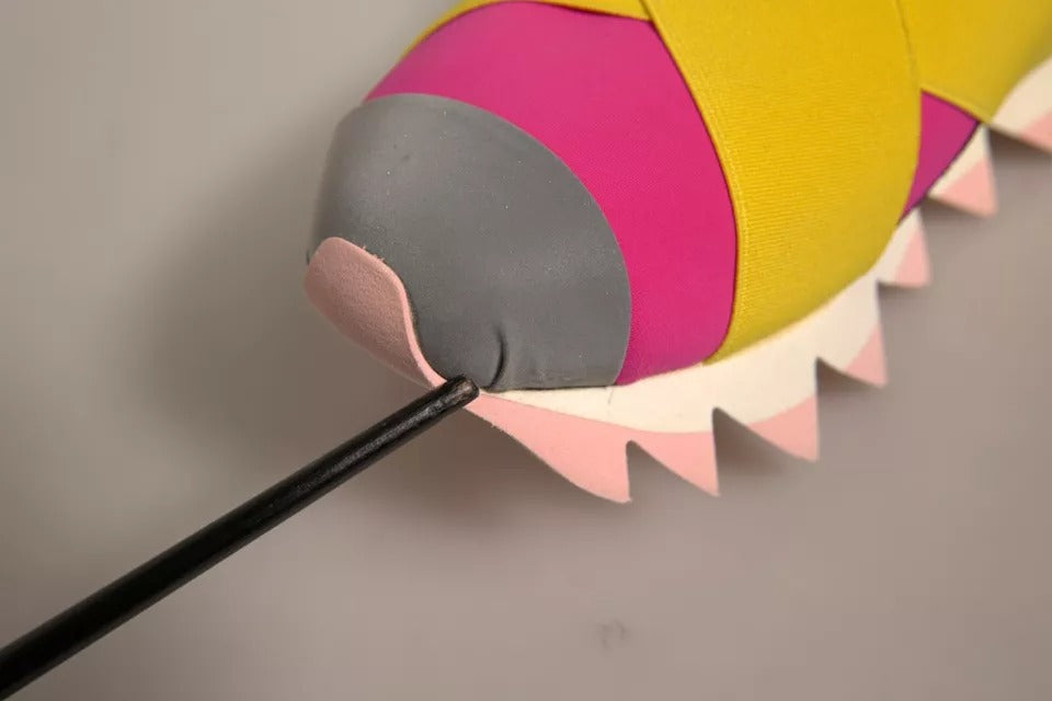 Caterpillar toy with antennae and legs