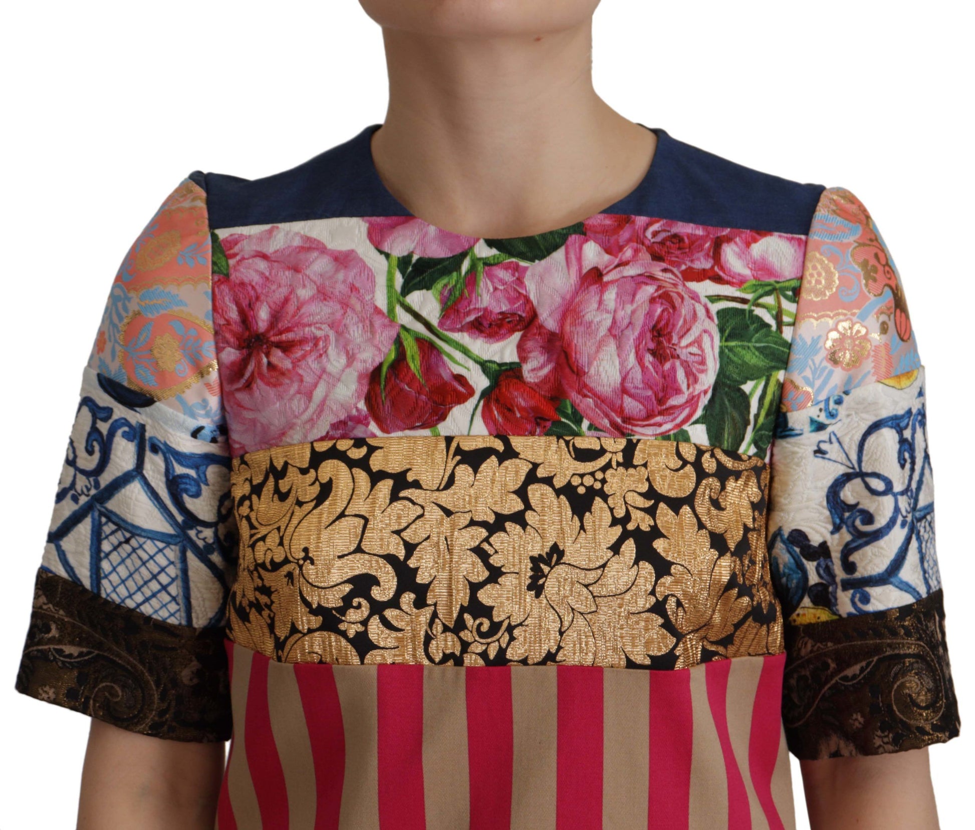 A colorful floral patterned dress with gold embroidery