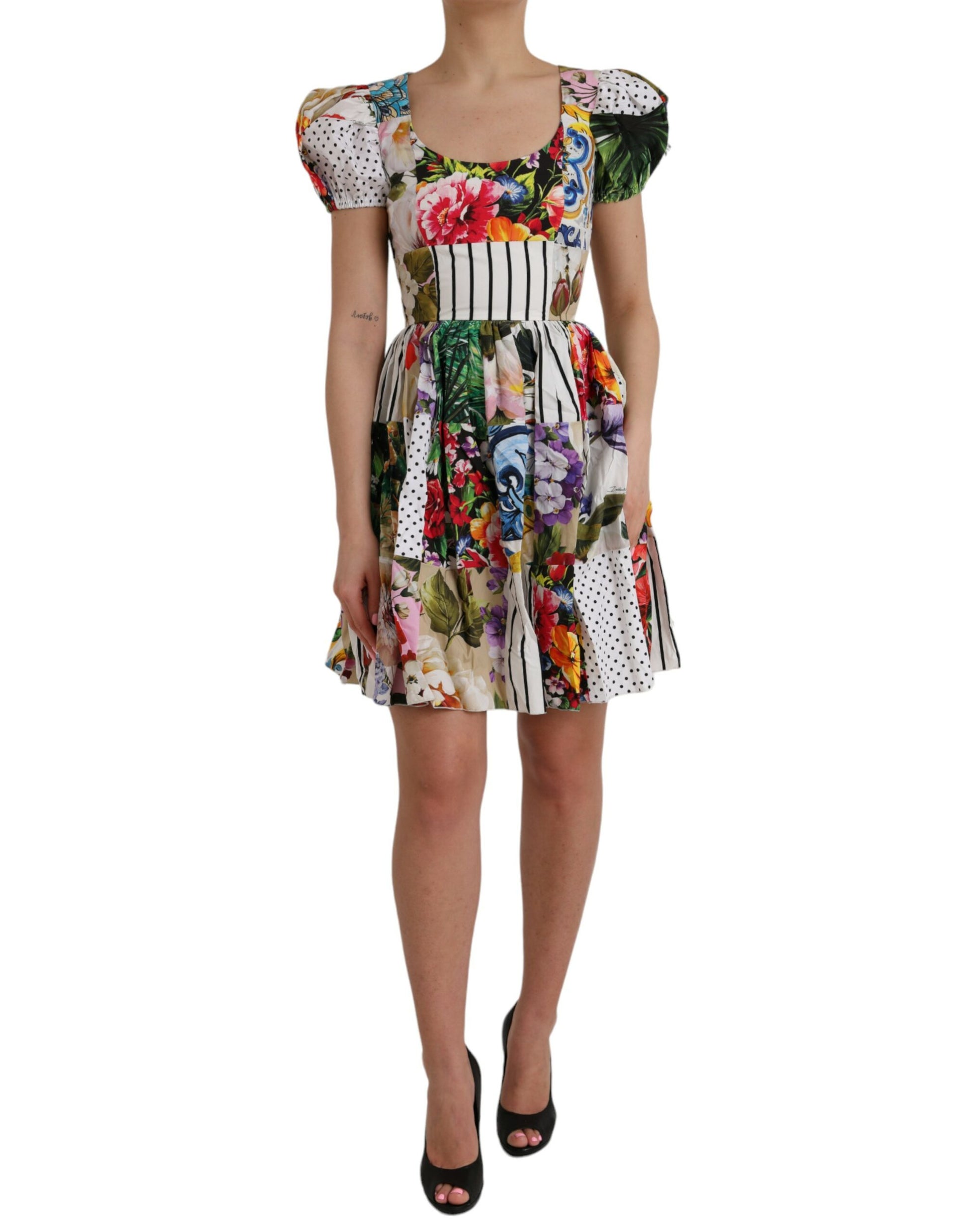 A colorful, floral patterned dress with short sleeves and a round neckline
