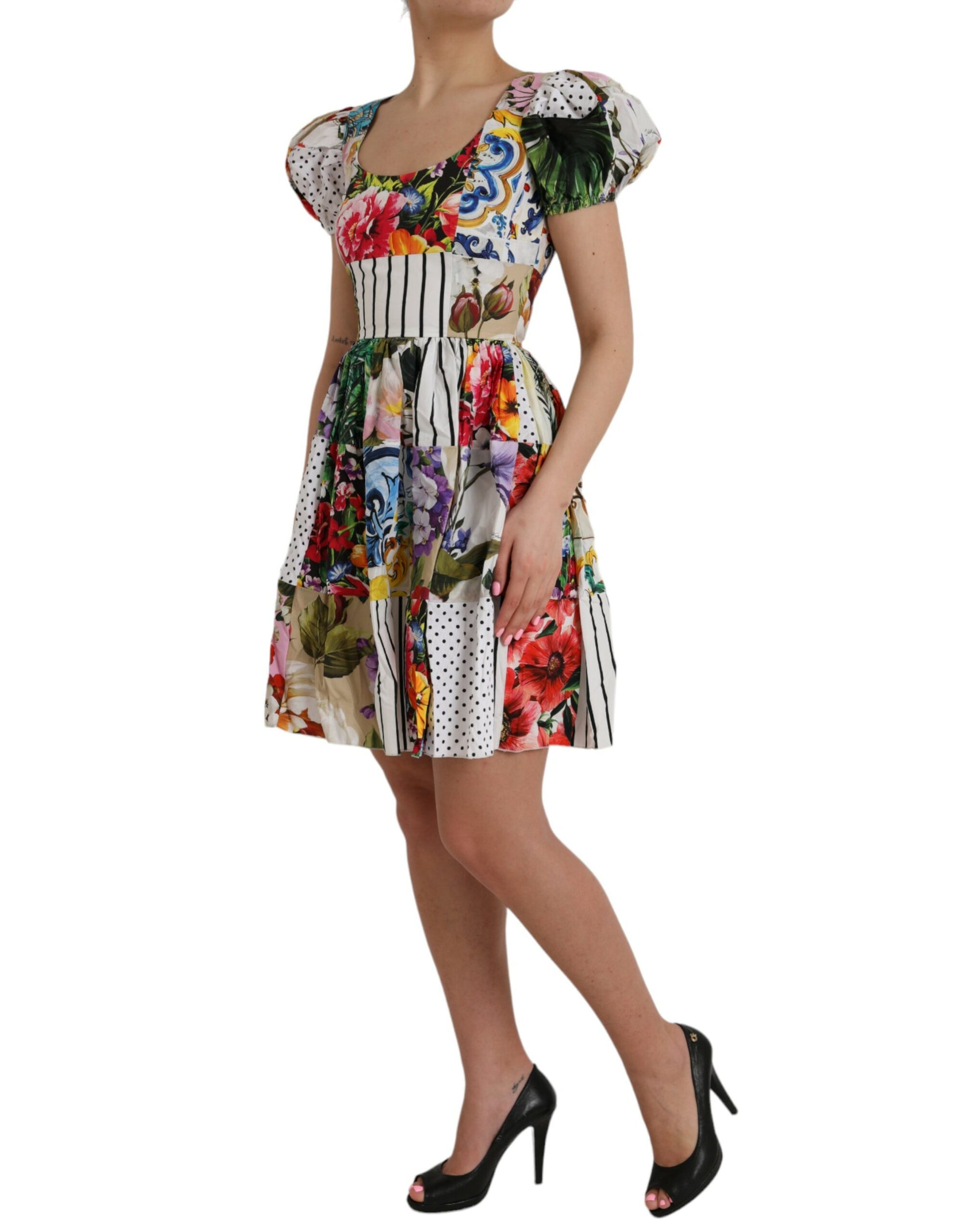 A colorful, floral print dress with short sleeves and a flared skirt