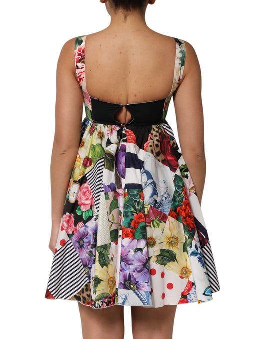 A colorful, floral patterned dress with a black waistband and short sleeves