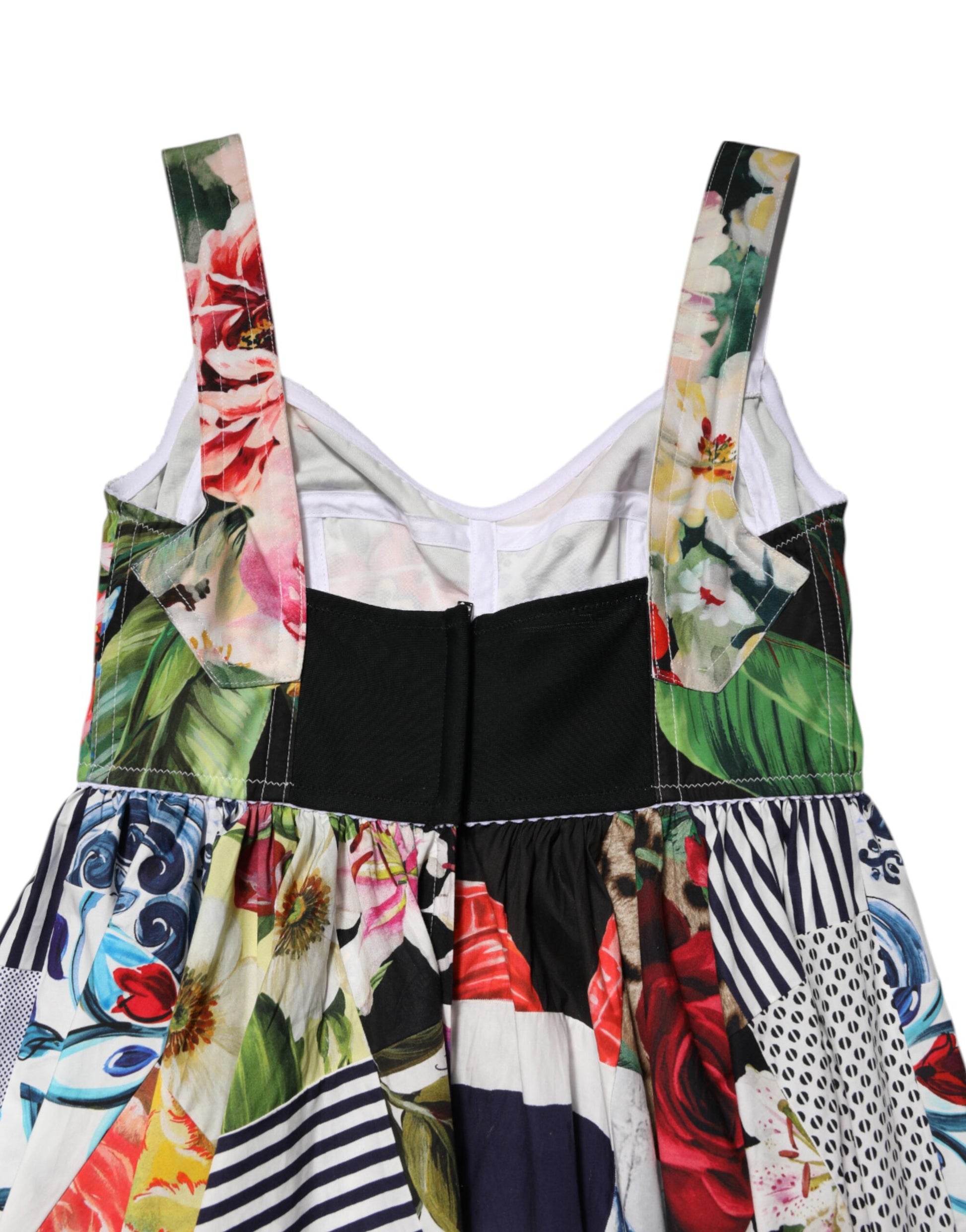 A colorful, floral patterned dress with a black waistband and short sleeves