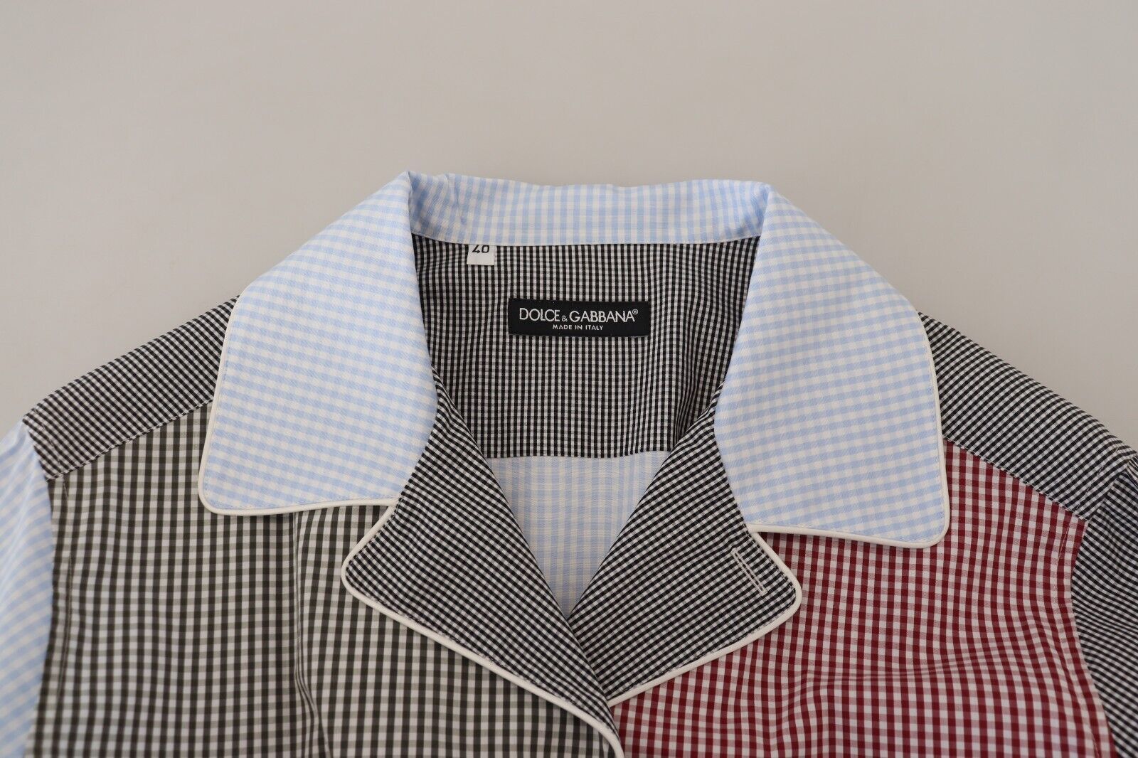 Blue shirt with white collar and cuffs