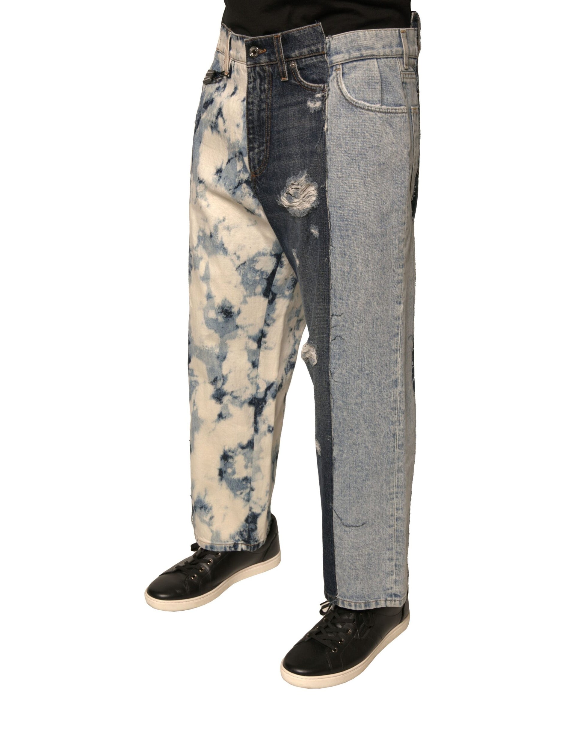 Man wearing blue jeans with distressed design