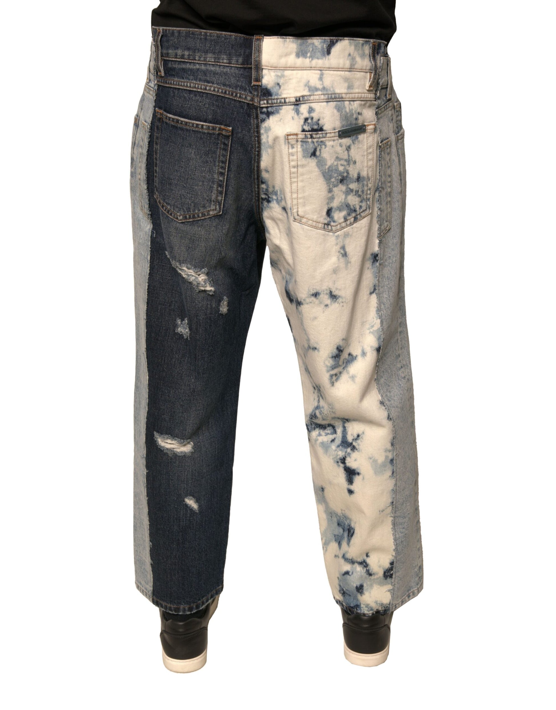 Pair of distressed denim jeans