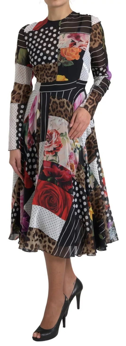 A woman wearing a multicolored patchwork floral leopard print dress with long sleeves and a high neckline
