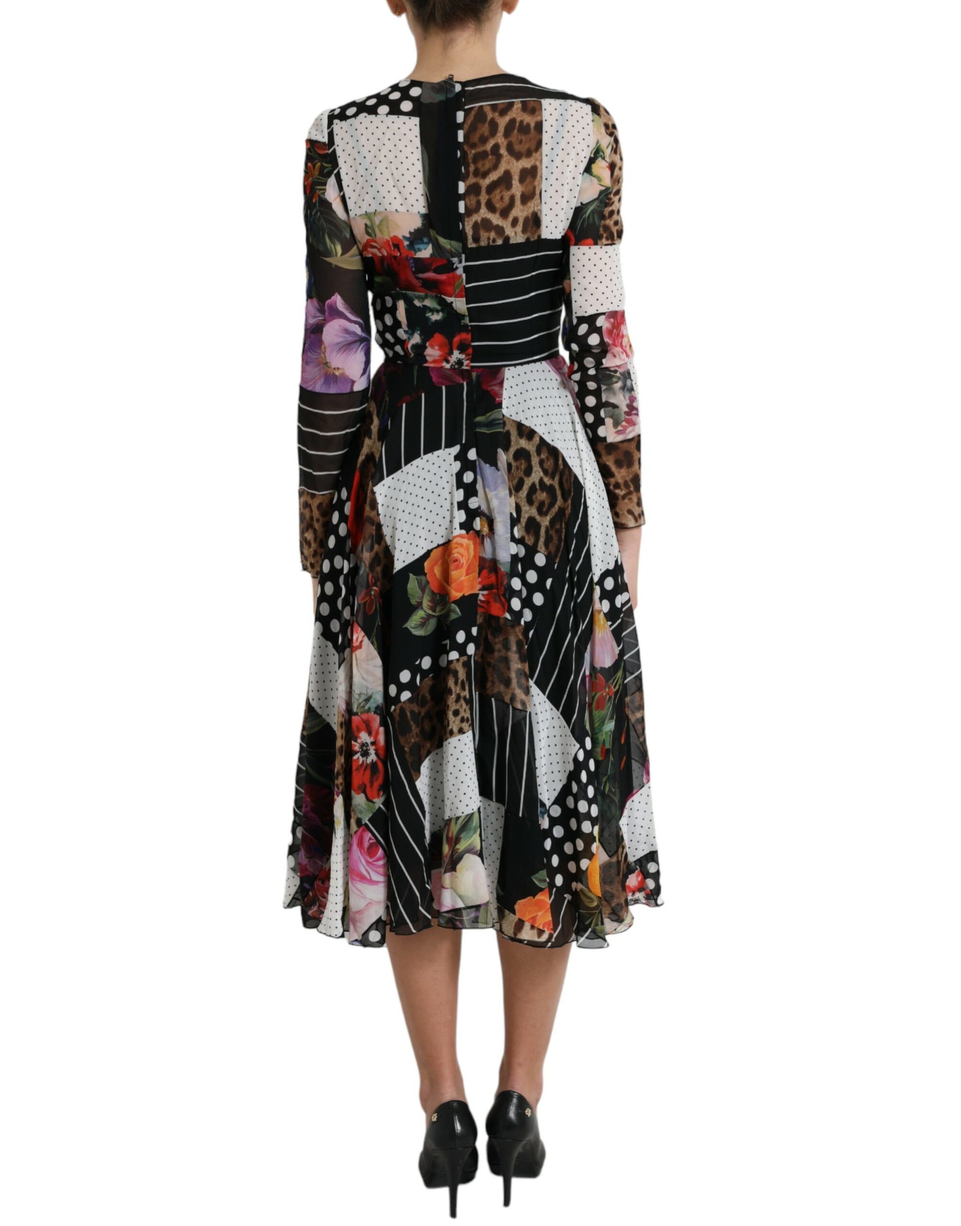 A long sleeve dress with a patchwork design featuring floral and leopard prints