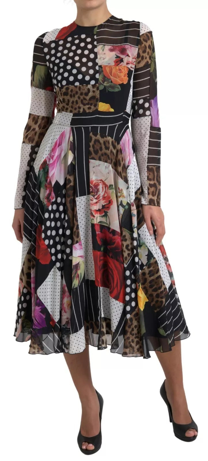 A woman wearing a multicolored patchwork dress with floral and leopard prints