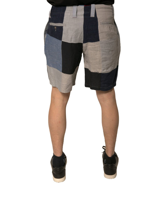 A pair of men's shorts with a patchwork design featuring various colors