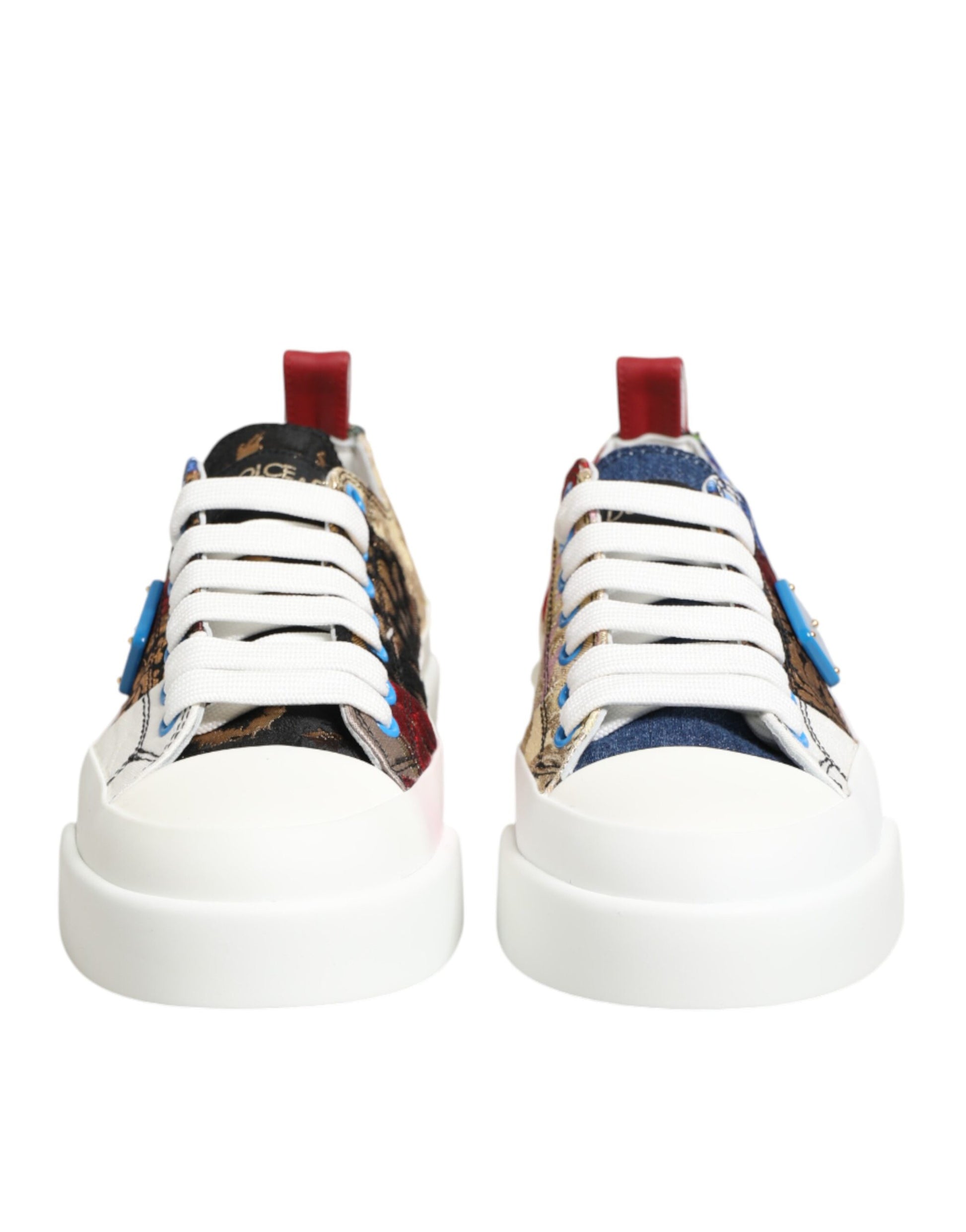 Pair of sneakers with red laces and a camouflage pattern on the side