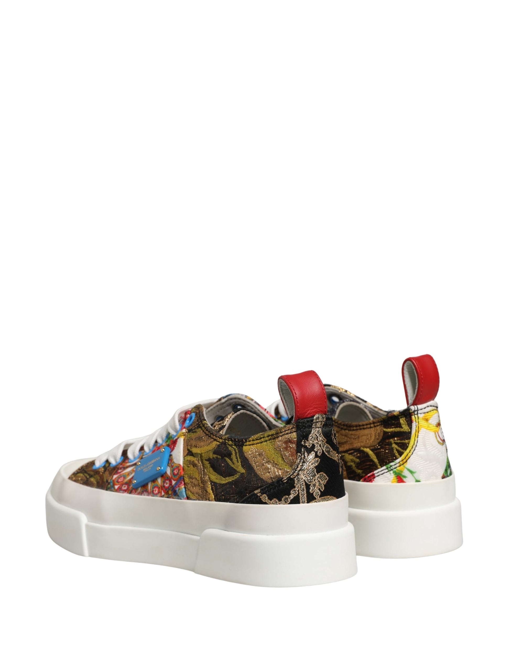 Colorful patchwork sneakers with red laces and a chunky sole