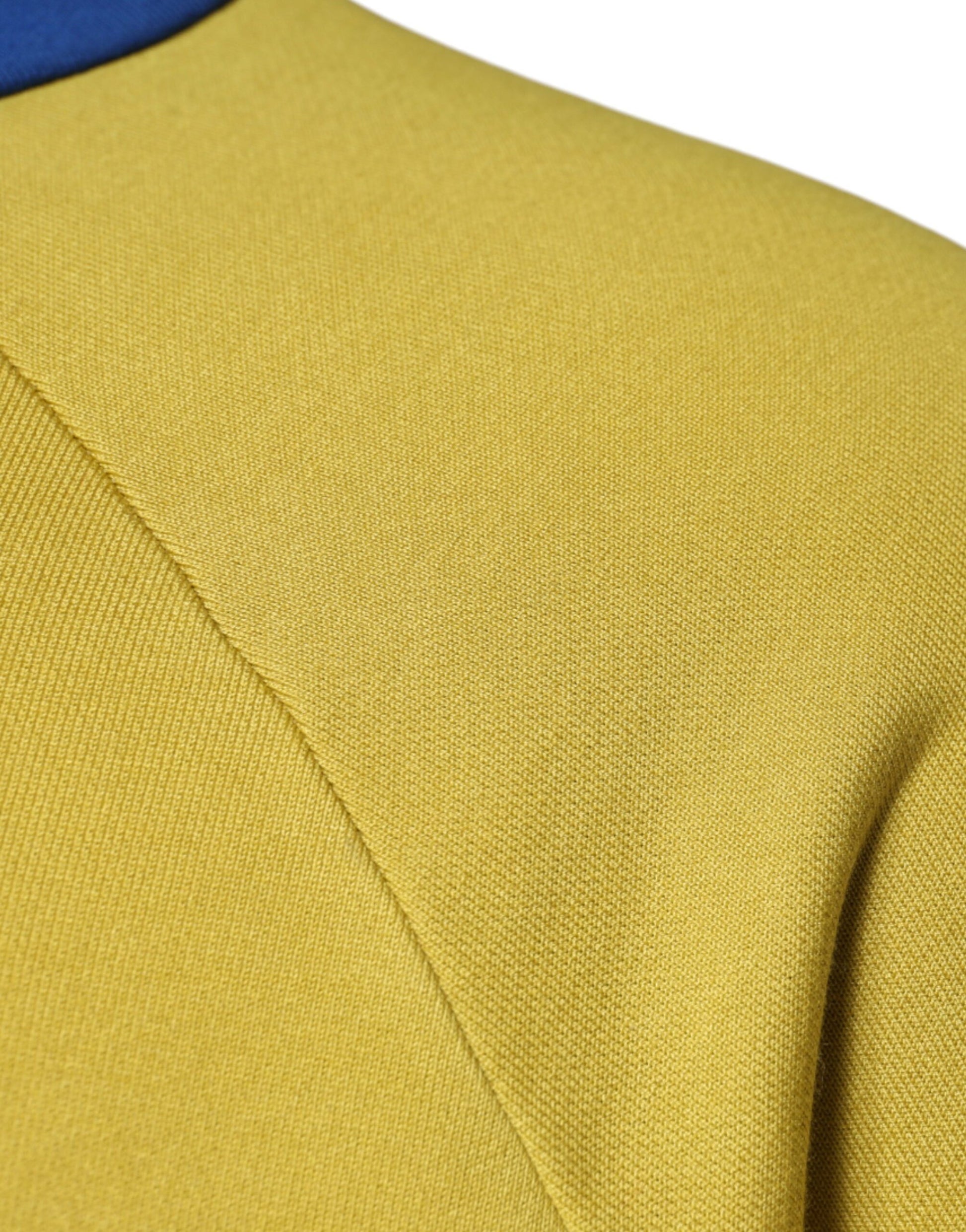 Yellow fabric with a blue collar
