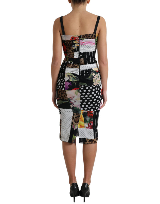 A black and white floral patterned dress with a patchwork design