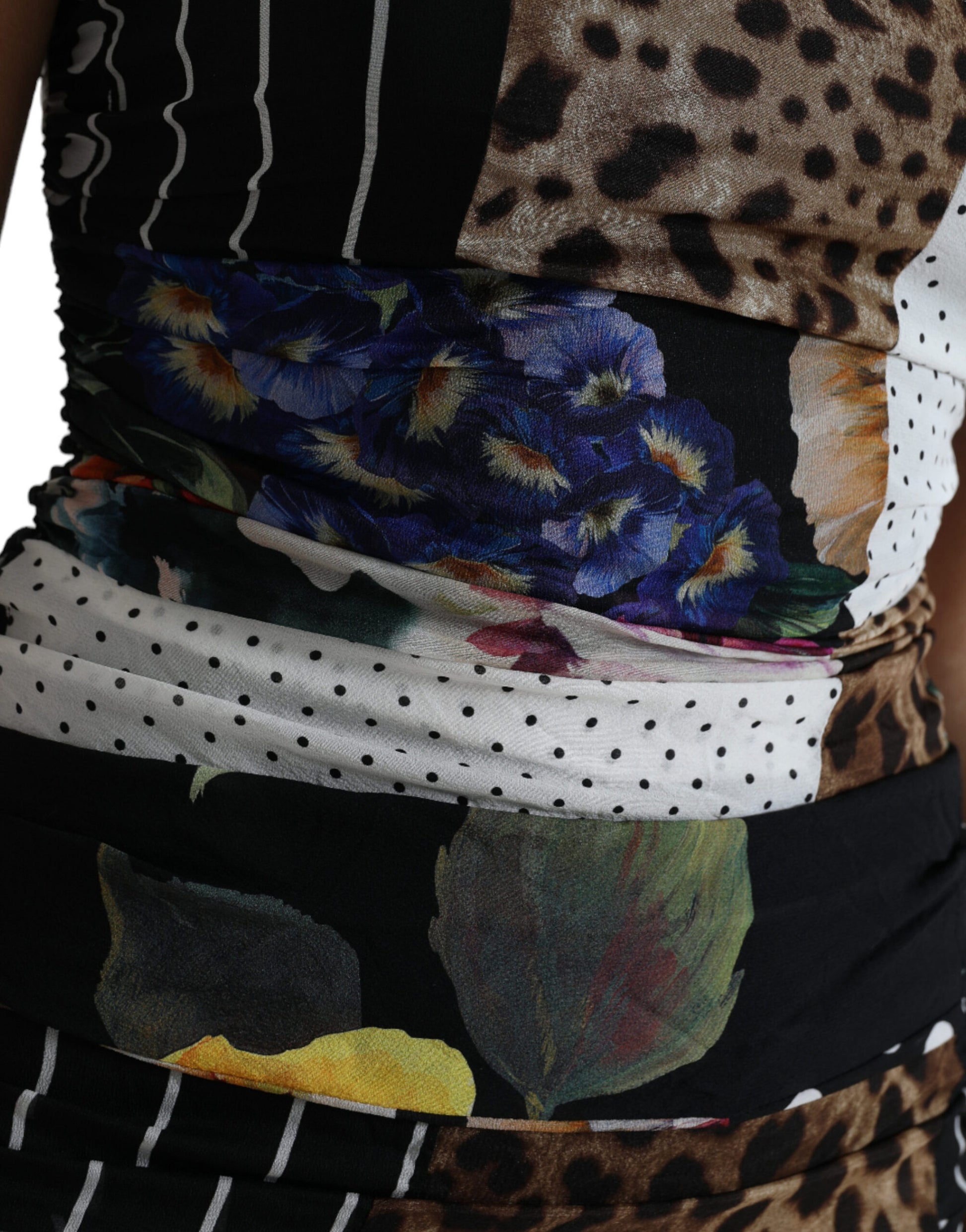 A colorful, floral print dress with leopard print accents