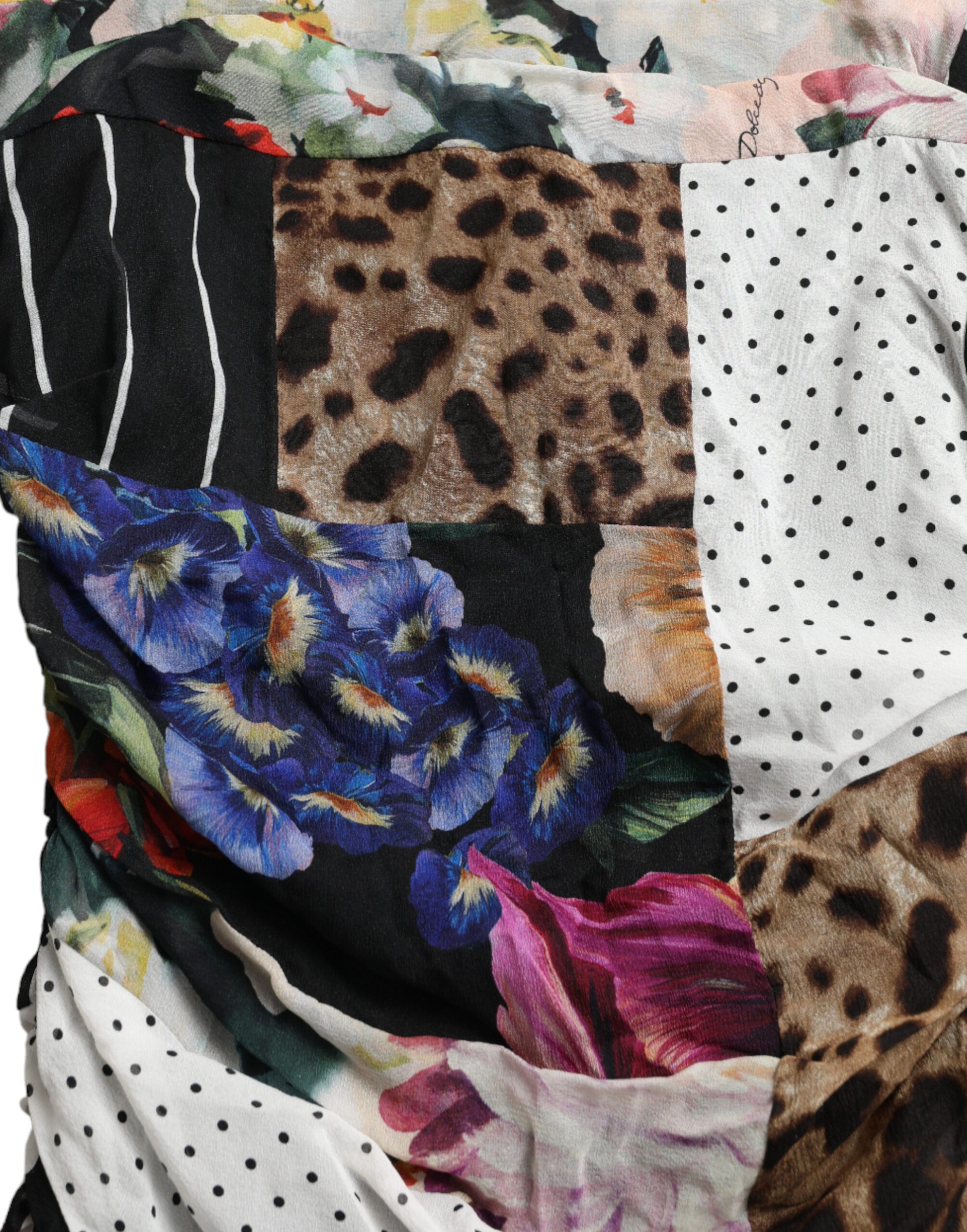 A colorful patchwork dress with floral and leopard prints