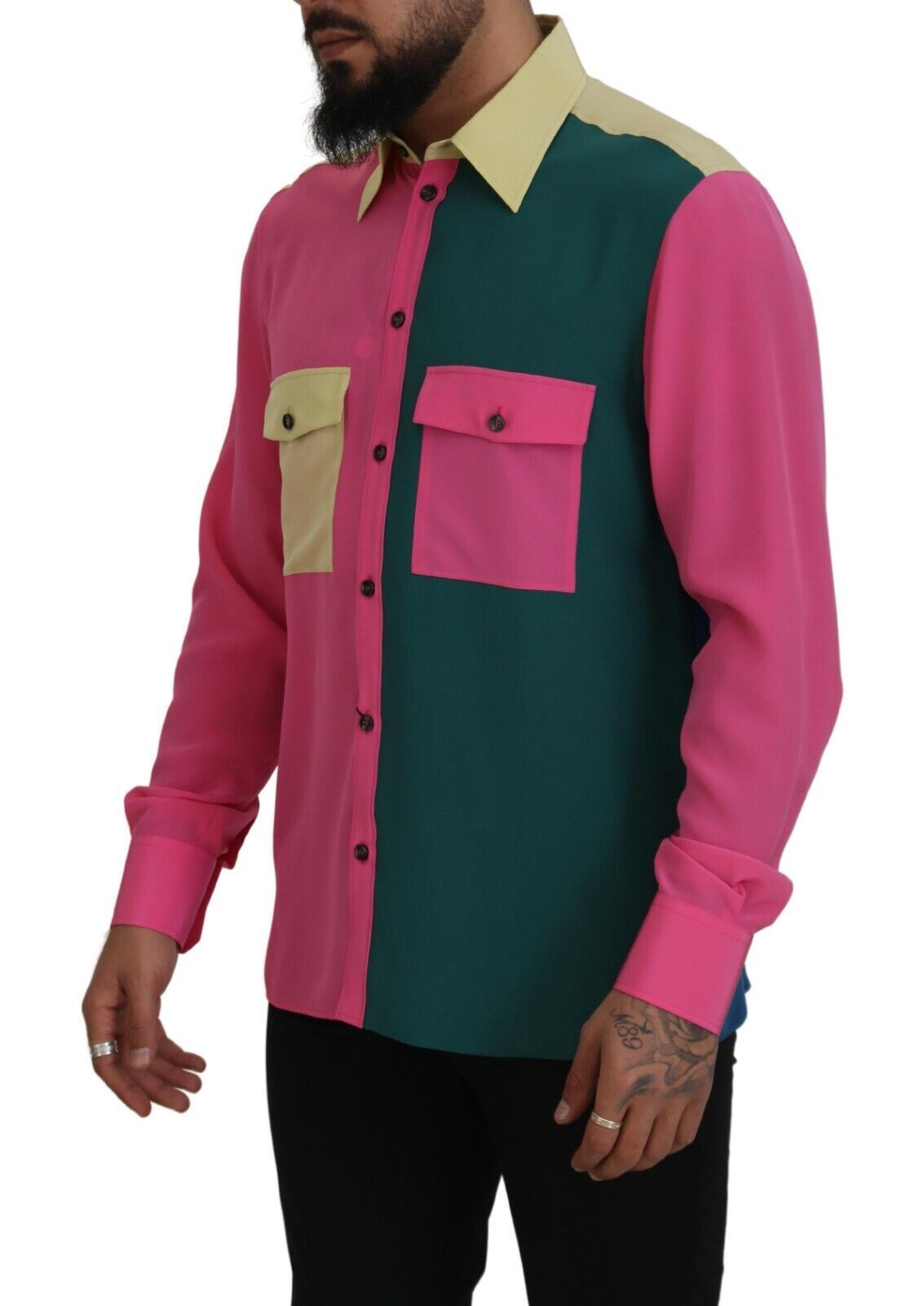 Man wearing long sleeve shirt with pink, green, and yellow patches