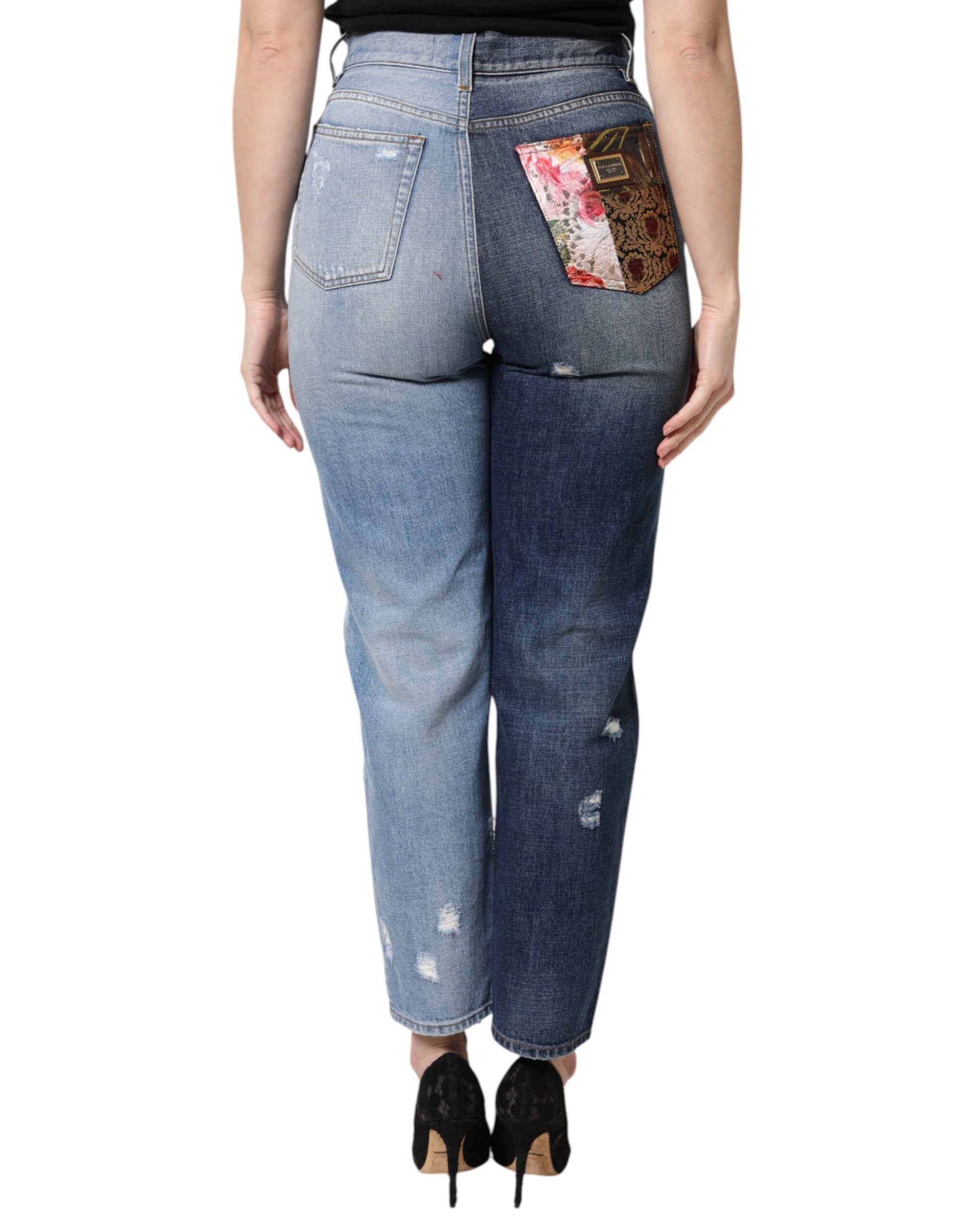 Pair of blue jeans with floral pattern on back pocket