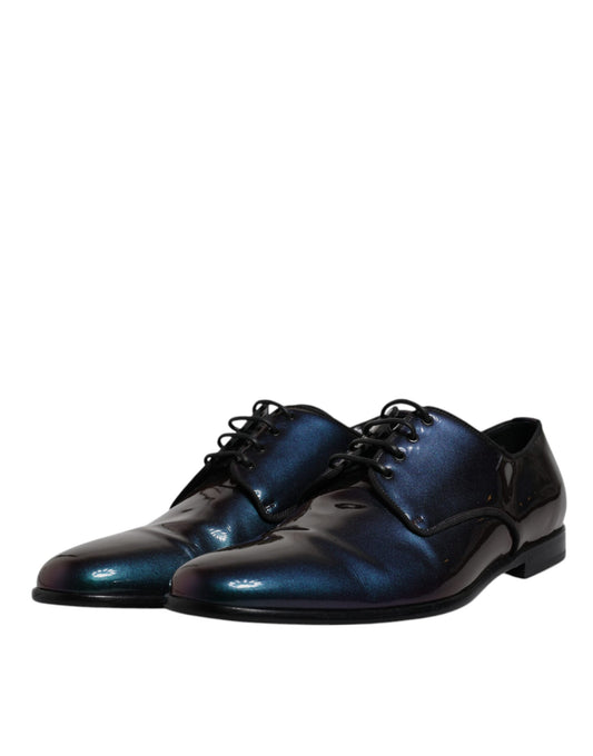 Black patent leather shoes with blue glitter detailing, featuring a peacock design
