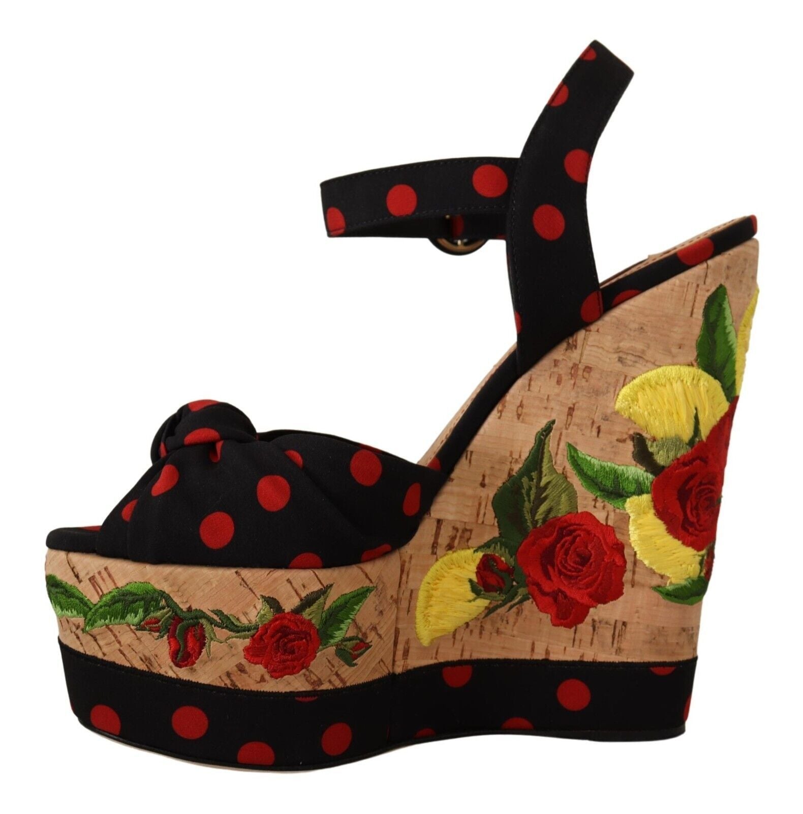 Black and red polka dot shoe with a floral design on the heel