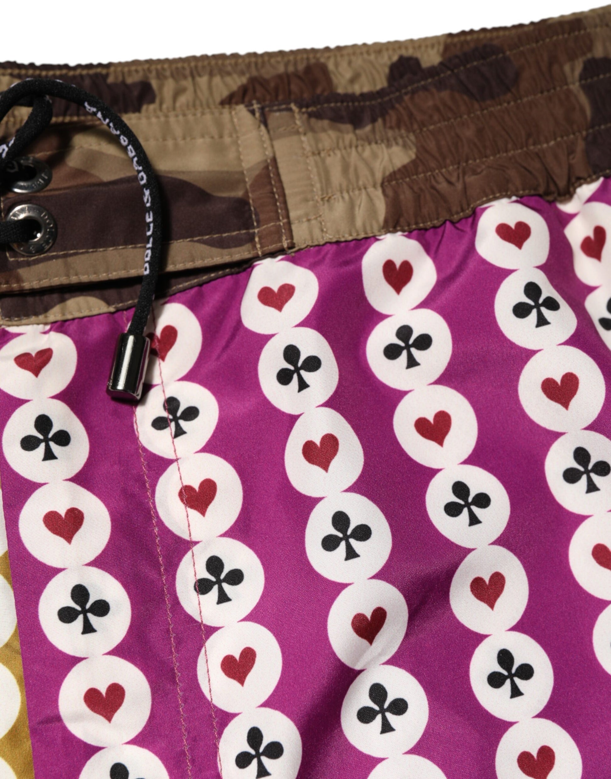 Camouflage shorts with a purple heart pattern on the side