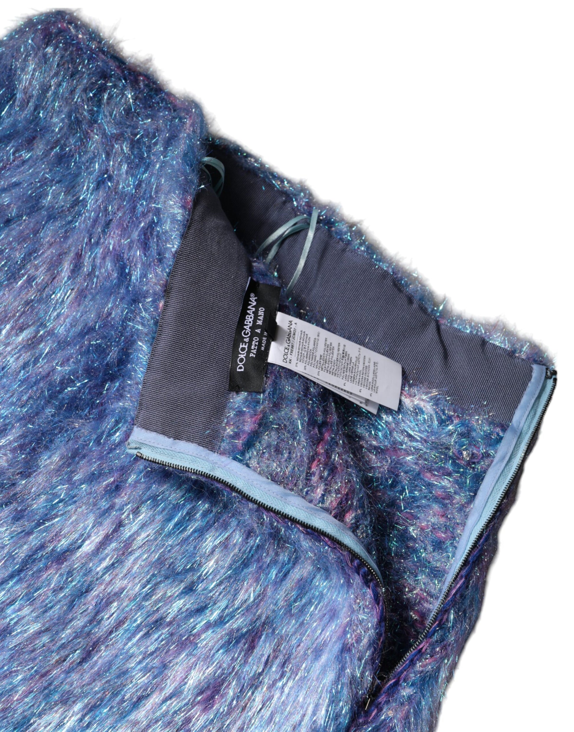 Furry garment with blue tag on hanger