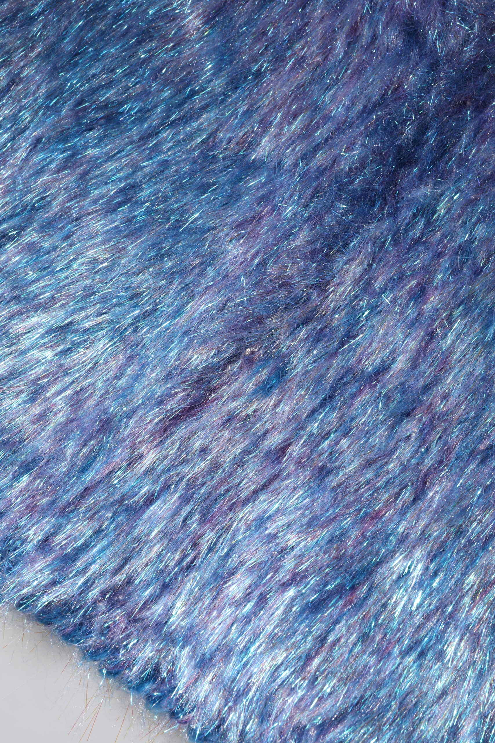 Blue fuzzy fabric with glittery specks
