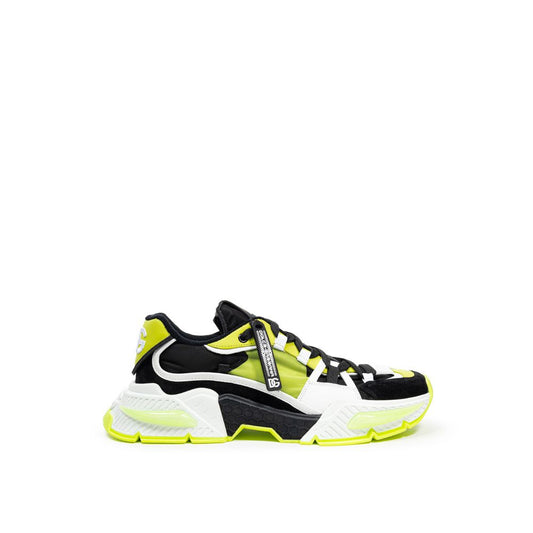 A single shoe against a white background. It is a high-top sneaker with a color scheme that includes black, yellow, and g